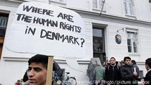 FILE PHOTO 26.09.2021***Some thirty Syrian refugees from different camps seeking asylum hold banners outside the Swedish Embassy in Copenhagen, Denmark on Wednesday, Sept. 26, 2012. The Syrians claim that Danes won't give them asylum because Denmark doesn't consider the civil war in Syria to affect all parts of Syria. Sweden gives a three-year temporary asylum to Syrians what ever part of Syria they come from. (AP Photo/POLFOTO/Jens Dresling) DENMARK OUT
