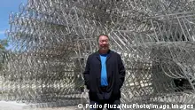 Entertainment Bilder des Tages Ai Weiweis exhibition Rapture in Lisbon Chinese artist Ai Weiwei poses in front of his sculpture Forever Bicycles during a press preview of his new exhibition Rapture at the Cordoaria Nacional in Lisbon, Portugal, on June 3, 2021. The world-renowned artist is putting on the biggest show of his career, offering Lisbon an immersion in his universe through his great classics but also new creations to pay tribute to Portugal where he took hold just before the Covid-19 pandemic. Lisbon Portugal fiuza-aiweiwei210603_npQgr PUBLICATIONxNOTxINxFRA Copyright: xPedroxFiuzax