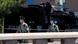 Two Chinese paramilitary policemen patroling the streets Two Chinese paramilitary policemen patroling the streets
