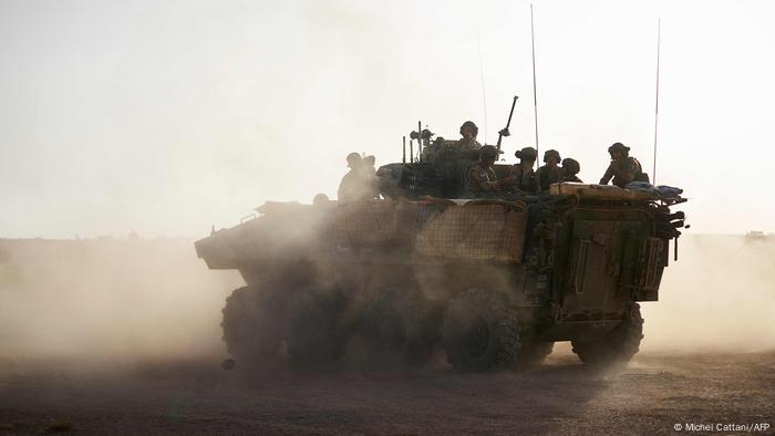 French soldiers patrol in northern Burkina Fasso in an Armoured Personnel Carrier (APC)