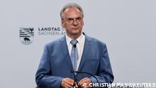 Saxony-Anhalt State Premier Reiner Haseloff of the Christian Democratic party (CDU) speaks after the first polls were published for the federal state election of Saxony-Anhalt, in Magdeburg, Germany, June 6, 2021. REUTERS/Christian Mang