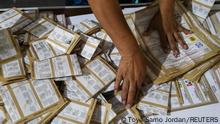 Electoral workers count ballots after polls closed on mid-term election day at a polling station in Los Reyes, Mexico City, Mexico, June 6, 2021. REUTERS/Toya Sarno Jordan