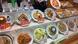 Plates of replica food in a display window Plates of replica food in a display window