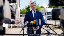 German Health Minister Jens Spahn of the Christian Democratic Union, CDU, party speaks to media as he arrives at the party's headquarters in Berlin, Germany, Monday, June 7, 2021. (AP Photo/Markus Schreiber)