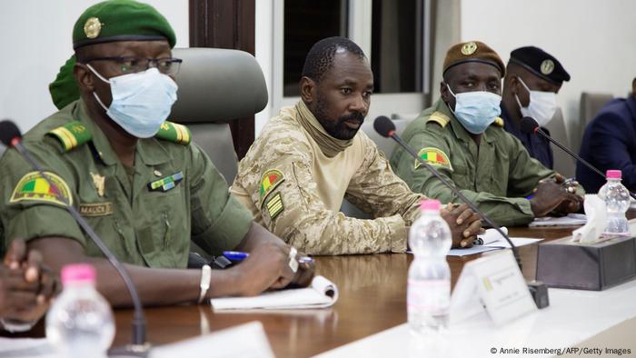 Military leaders sitting around a table