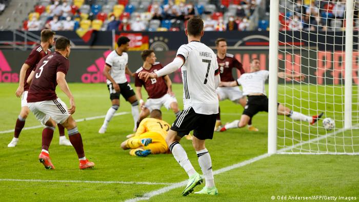 Kai Havertz forces and own goal here for Germany's fourth.