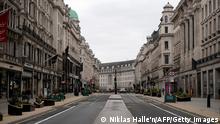 A near-deserted Regent Street is pictured in London on Sunday afternoon, March 21, 2021, as the government prepares to gradually lift restrictions following a third shutdown to combat the spread of coronavirus. - Many parts of the UK are following a road map out of a third coronavirus lockdown, as the country nears the one year anniversary of the UK government's first stay at home order of the pandemic, on March 23. (Photo by Niklas HALLE'N / AFP) (Photo by NIKLAS HALLE'N/AFP via Getty Images)