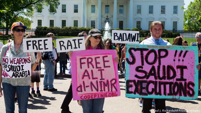 Protestors with Code Pink march in front of the White House April 20, 2016, Washington, DC to bring attention to the plight of three Saudi Arabian youths.