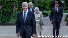Britain's Queen Elizabeth II, centre walks with French President Emmanuel Macron, Britain's Prime Minister Boris Johnson and US President Joe Biden, during a reception for the G7 leaders at the Eden Project in Cornwall, England, Friday June 11, 2021, during the G7 summit. (Jack Hill/Pool via AP)