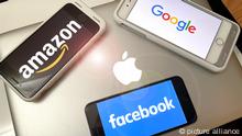 Photo by: STRF/STAR MAX/IPx 2021 6/11/21 Lawmakers unveil major bipartisan antitrust reforms that could reshape Amazon, Apple, Facebook and Google. STAR MAX Photo:: Google, Facebook, Amazon and Apple logos are photographed on multiple Apple devices.