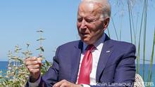 U.S. President Joe Biden reacts during a bilateral meeting with France's President Emmanuel Macron during the G7 summit in Carbis Bay, Cornwall, Britain, June 12, 2021. REUTERS/Kevin Lamarque
