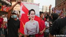 FILE PHOTO: Demonstrators protest against the military coup and demand the release of elected leader Aung San Suu Kyi, in Yangon, Myanmar, February 6, 2021. REUTERS/Stringer/File Photo