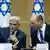 Prime Minister Naftali Bennett (R) and Yair Lapid attend the first cabinet meeting of the new coalition government in Jerusalem, on June 13, 2021.
