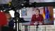 Chanceler federal Angela Merkel discursa em vídeo exibido na televisão Chanceler federal Angela Merkel discursa em vídeo exibido na televisão