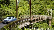 San Isidro de Peñas Blancas suspension bridge over crosses the Penas Blancas River in central Costa Rica. Bridge between La Fortuna and San Ramon in de 141 road, Costa Rica, Alajuela province, Costa Rica, Central America.