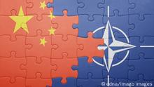 puzzle with the national flag of china and nato . concept