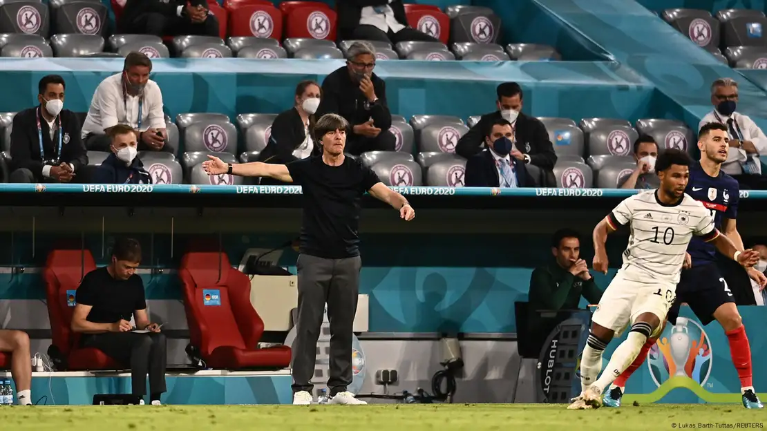 Germany's Mats Hummels, centre, heads on goal during the Euro 2020