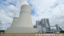SPREMBERG, GERMANY - JULY 09: The Schwarze Pumpe coal-fired power plant stands during a ground breaking ceremony for a new electricity storage facility on July 09, 2019 in Spremberg, Germany. The new facility, called Big Battery and to be built by local energy provider LEAG AG, will have a capacity of 53MW and is intended to compensate for power fluctuations from nearby renewable energy sources. Germany is investing heavily in alternative energy and is developing means for storing power in order to compensate when wind or solar output is low.(Photo by Sean Gallup/Getty Images)