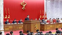 In this photo provided by the North Korean government, North Korean leader Kim Jong Un, center, speaks during a Workers' Party meeting in Pyongyang, North Korea, Tuesday, June 15, 2021. Kim warned about possible food shortages and called for his people to brace for extended COVID-19 restrictions as he opened a major political conference to discuss national efforts to salvage a broken economy. the North’s official Korean Central News Agency said Wednesday, June 16, 2021. Independent journalists were not given access to cover the event depicted in this image distributed by the North Korean government. The content of this image is as provided and cannot be independently verified. Korean language watermark on image as provided by source reads: KCNA which is the abbreviation for Korean Central News Agency. (Korean Central News Agency/Korea News Service via AP)