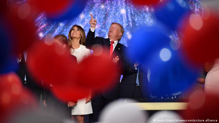 Donald Trump and Melania Trump surrounded by balloons