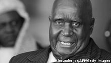 Zambian First President Kenneth Kaunda is pictured as Rupiah Banda (not pictured) is sworn in as Zambia's fourth president in Lusaka on November 2, 2008 after a narrow election win over opposition leader Michael Sata, whose supporters rioted during the night over alleged vote fraud. Banda was sworn in just two hours after election officials declared him the winner with 40.09 percent of the vote to Sata's 38.13 percent. AFP PHOTO / ALEXANDER JOE (Photo credit should read ALEXANDER JOE/AFP via Getty Images)