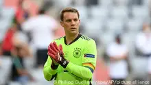 Germany's goalkeeper Manuel Neuer walks on the pitch during the Euro 2020 soccer championship group F match between Portugal and Germany at the Football Arena stadium in Munich, Germany, Saturday, June 19, 2021. (Philipp Guelland/Pool via AP)