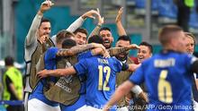 Italy's midfielder Matteo Pessina (C) celebrates the first goal with teammates during the UEFA EURO 2020 Group A football match between Italy and Wales at the Olympic Stadium in Rome on June 20, 2021. (Photo by ALBERTO LINGRIA / POOL / AFP) (Photo by ALBERTO LINGRIA/POOL/AFP via Getty Images)