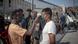 Toma de temperatura en un campamento de refugiados en Grecia. Toma de temperatura en un campamento de refugiados en Grecia.