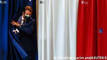 French President Emmanuel Macron is seen at a polling station during the first round of French regional and departmental elections, in Le Touquet-Paris-Plage, France June 20, 2021. REUTERS/Christian Hartmann/Pool TPX IMAGES OF THE DAY