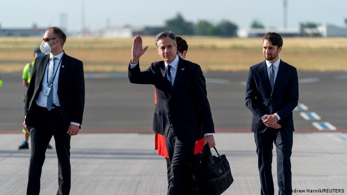 US Secretary of State Antony Blinken arrives at Berlin Brandenburg Airport in Germany, waves