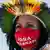 Mulher indígena protesta contra Bolsonaro em Brasília, em junho de 2021
