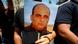 Demonstrator holding a picture of Nizar Banat Demonstrator holding a picture of Nizar Banat