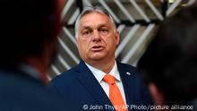 Hungary's Prime Minister Viktor Orban talks to journalists as he arrives for an EU summit at the European Council building in Brussels, Thursday, June 24, 2021. At their summit in Brussels, EU leaders are set to take stock of coronavirus recovery plans, study ways to improve relations with Russia and Turkey, and insist on the need to develop migration partners with the countries of northern Africa, but a heated exchange over a new LGBT bill in Hungary is also likely. (John Thys, Pool Photo via AP)