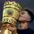 Borussia Dortmund's Jadon Sancho kisses the German Cup in May 2021