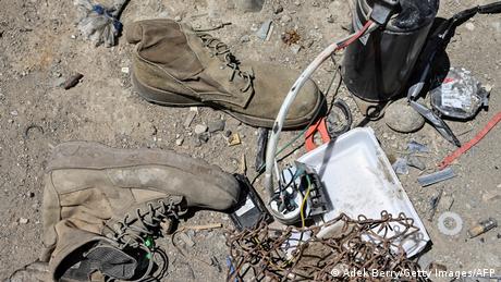 Shoes, wire and more US garbage at the Bagram junkyard
