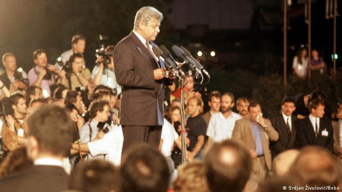 Milan Kučan speaks with Slovenians gathered around him to listen in 1991