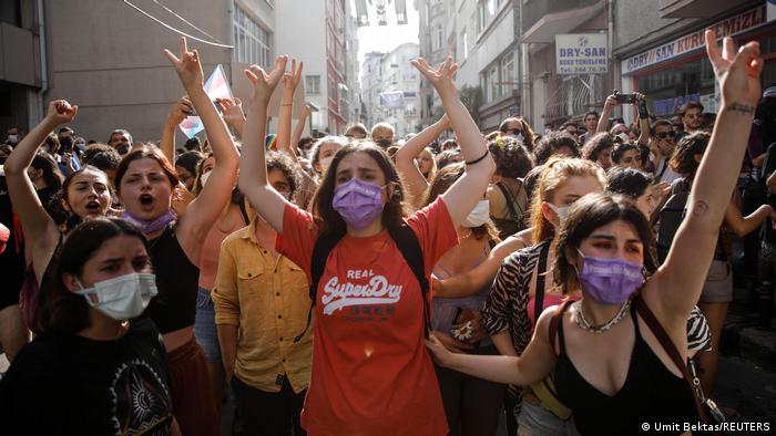 Demonstrators march as they try to gather for a Pride parade, which was banned by local authorities, in central Istanbul