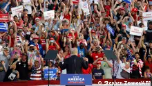 Former US President Donald Trump turns around to face his supporters during his campaign-style rally in Wellington, Ohio, on June 26, 2021. - Donald Trump held his first big campaign-style rally since leaving the White House, giving a vintage, rambling speech Saturday to an adoring audience as he launched a series of appearances ahead of next year's midterm elections.
The former president, who has been booted from social media platforms and faces multiple legal woes, has flirted with his own potential candidacy in 2024, but in the 90-minute address at a fair grounds in Ohio he made no clear mention of his political future, even when the crowd chanted four more years! four more years! (Photo by STEPHEN ZENNER / AFP)