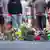Flowers on the ground in Würzburg on June 25, 2021, after a knife attack in the city center