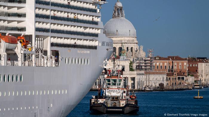 A large cruiseship is seen pulling into Venice