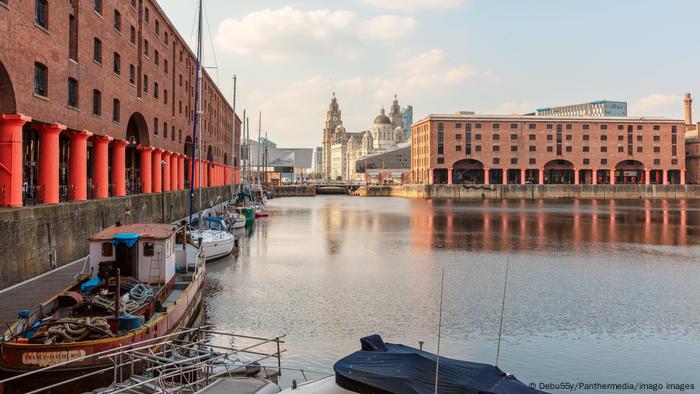 Liverpool Maritime Mercantile City with small boats in the front part of the image