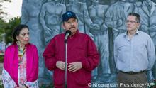 Handout picture released by Nicaraguan Presidency shows Nicaraguan President Daniel Ortega (C), Vice-President Rosario Murillo (L) and Carlos Fonseca Teran (R) attending to the anniversary ceremony of Sandinista leader Carlos Fonseca Amador birth at the Plaza de la Revolución in Managua on June 23, 2021. - Nicaraguan President Daniel Ortega, assured on Wednesday that the 19 opposition members imprisoned five months before the elections are not candidates or politicians but criminals who attempted against the security of the country by trying to organize a coup d'état. (Photo by Handout / Nicaraguan Presidency / AFP) / RESTRICTED TO EDITORIAL USE - MANDATORY CREDIT AFP PHOTO / NICARAGUAN PRESIDENCY / CESAR PEREZ - NO MARKETING - NO ADVERTISING CAMPAIGNS - DISTRIBUTED AS A SERVICE TO CLIENTS