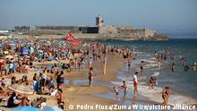 June 26, 2021, Lisbon, Portugal: Beachgoers enjoy a summer day at the Carcavelos beach as the COVID-19 coronavirus pandemic continues, in Cascais, near Lisbon, Portugal, on June 26, 2021. (Credit Image: © Pedro Fiuza/ZUMA Wire