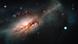 Composición en color del Observatorio Las Cumbres y el Telescopio Espacial Hubble de la supernova de captura de electrones 2018zd (el gran punto blanco de la derecha) y la galaxia anfitriona NGC 2146 (hacia la izquierda). Composición en color del Observatorio Las Cumbres y el Telescopio Espacial Hubble de la supernova de captura de electrones 2018zd (el gran punto blanco de la derecha) y la galaxia anfitriona NGC 2146 (hacia la izquierda).