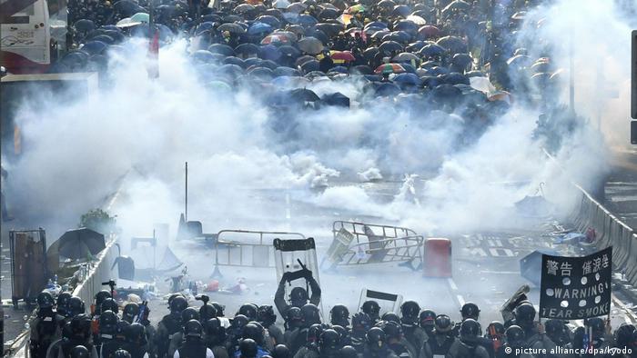 Police use tear gas against pro-democracy protesters in Hong Kong