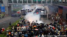 Anti-extradition bill protesters react after tear gas was fired by riot police during a protest to demand democracy and political reforms, at Tsuen Wan, in Hong Kong, China August 25, 2019. REUTERS/Tyrone Siu/File photo SEARCH YIK SECURITY FOR THIS STORY. SEARCH WIDER IMAGE FOR ALL STORIES