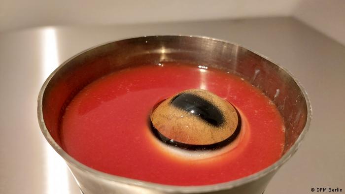 Pickled sheep eyeball in tomato juice