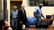 Subordinate of former head of Serbia's state security service Jovica Stanisic, Franko Frenki Simatovic, appears in court at the UN International Residual Mechanism for Criminal Tribunals (IRMCT) in The Hague, Netherlands June 30, 2021. REUTERS/Piroschka van de Wouw/Pool