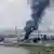 Plume of black smoke rises from the Romania oil refinery