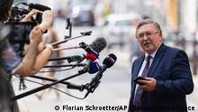 Russia's Governor to the International Atomic Energy Agency (IAEA), Mikhail Ulyanov, addresses the media in front of the 'Grand Hotel Vienna' where closed-door nuclear talks take place in Vienna, Austria, Sunday, June 20, 2021. (AP Photo/Florian Schroetter)
